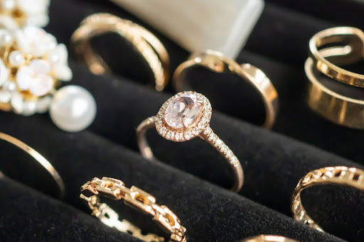 Gold rings are arranged in a ring holder.