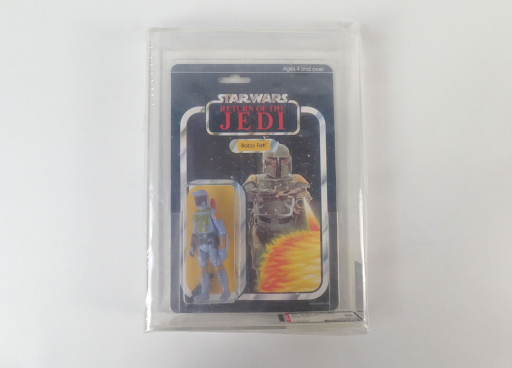 A Boba Fett action figure from the movie Star Wars is pictured. It is in mint condition.